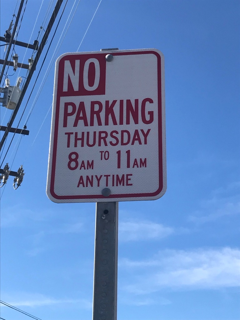 No Parking signs that list times but also say 